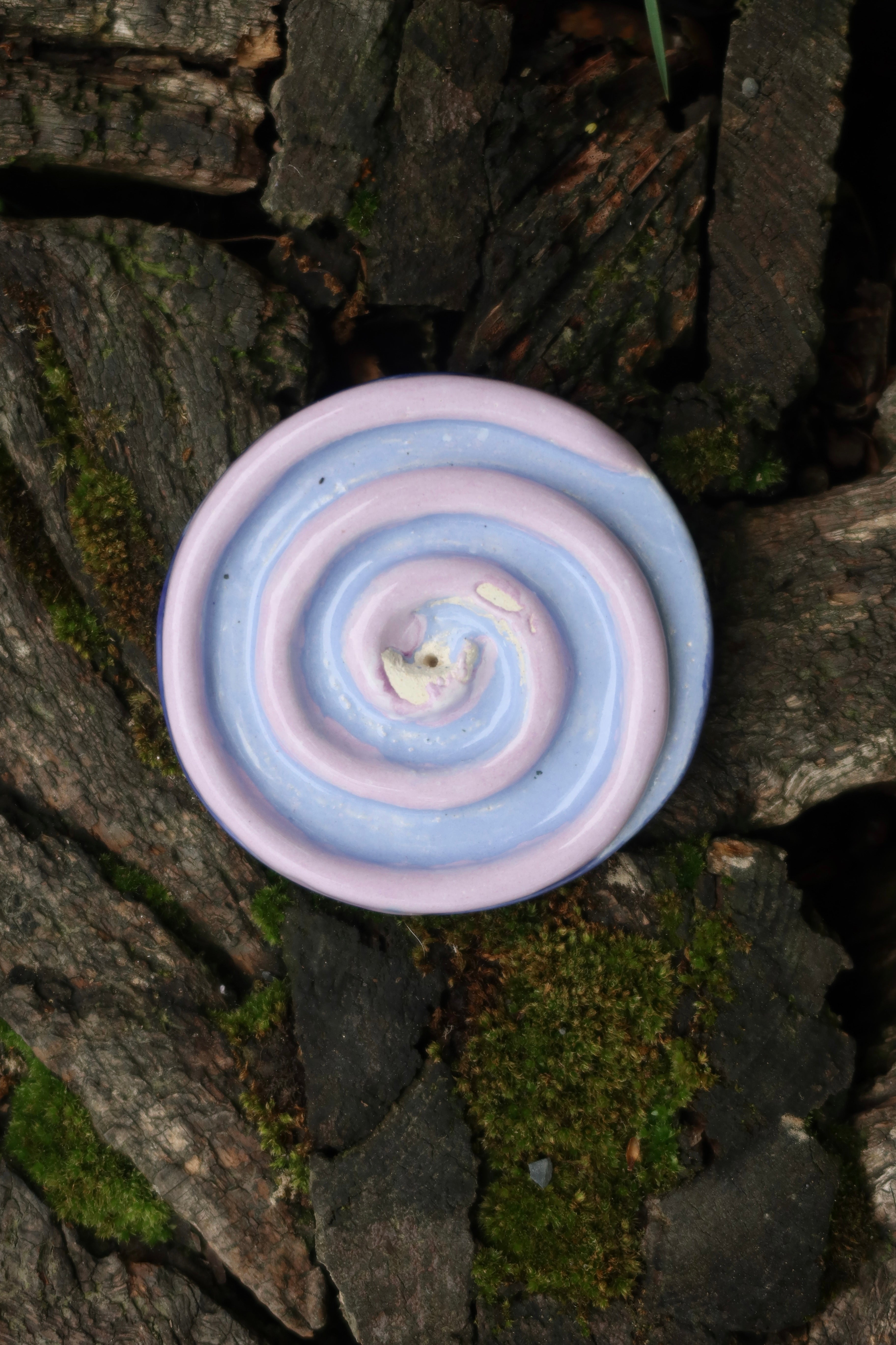 Pink spiral incense holder